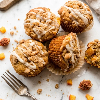 Juicy Peach Muffins with Streusel